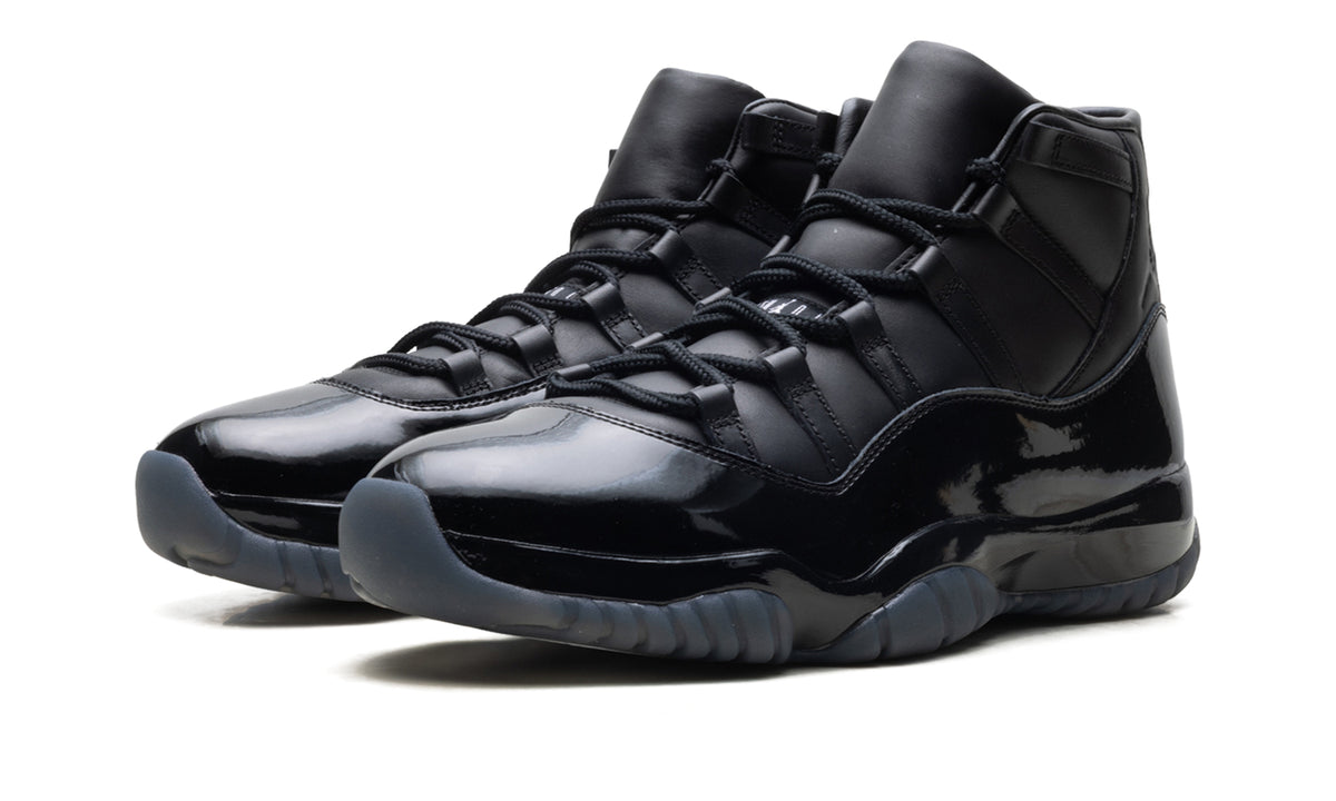 Air Jordan 11 Retro Sneakers - All Black with Glossy Mudguard and Smoky Outsole