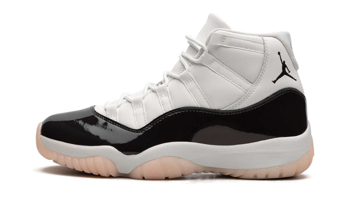 Air Jordan 11 Retro High-Top Sneakers - White and Glossy Black with Pale Peach Outsole