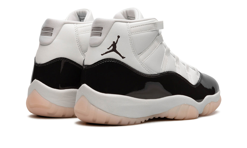Air Jordan 11 Retro High-Top Sneakers - White and Glossy Black with Pale Peach Outsole