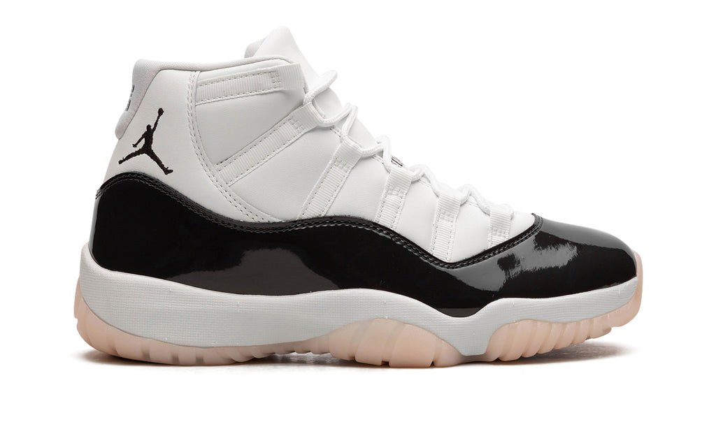 Air Jordan 11 Retro High-Top Sneakers - White and Glossy Black with Pale Peach Outsole