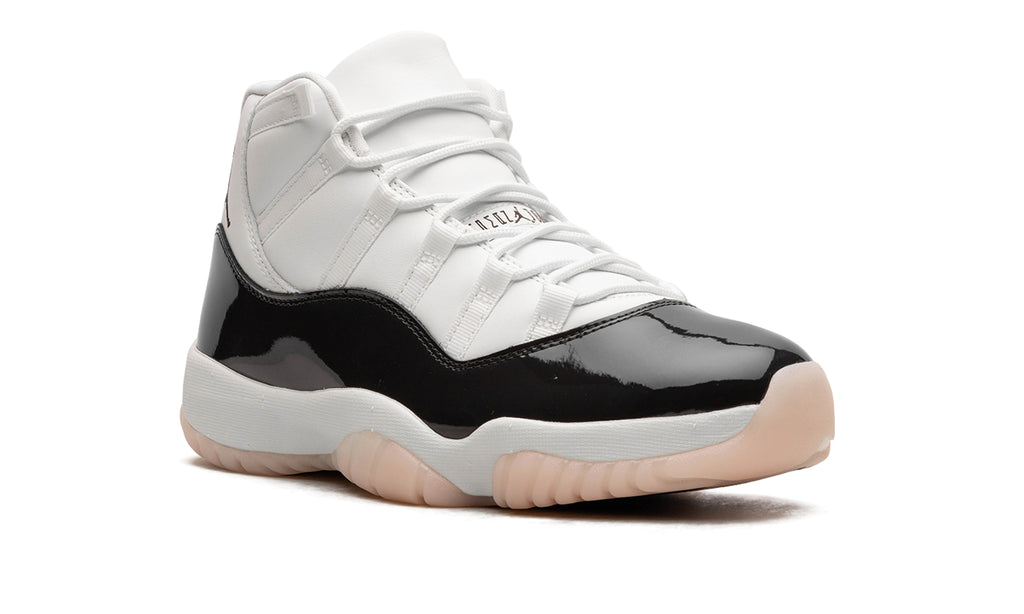 Air Jordan 11 Retro High-Top Sneakers - White and Glossy Black with Pale Peach Outsole