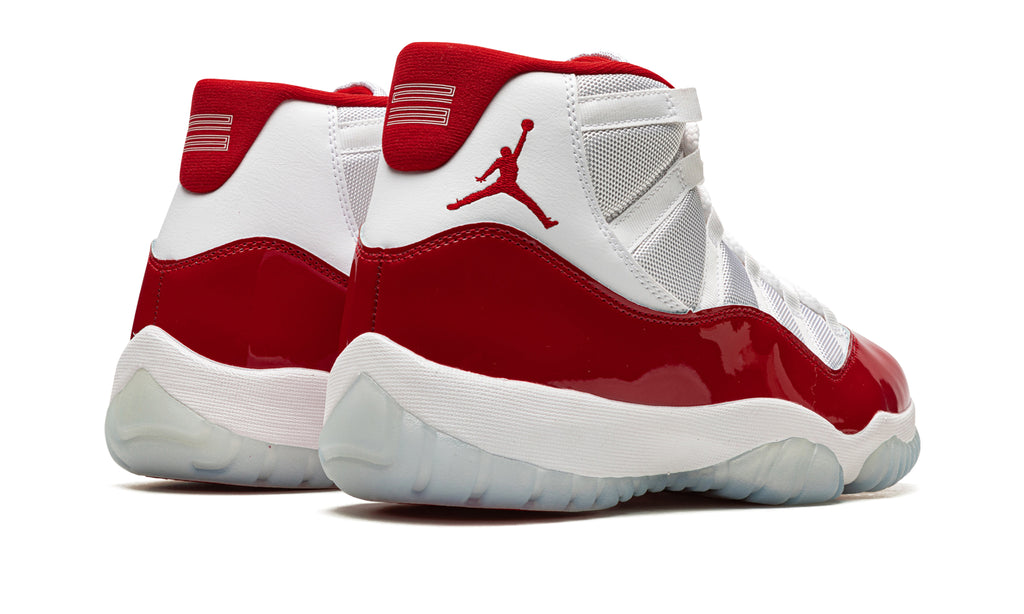 Air Jordan 11 Retro High-Top Sneakers - White and Red with Glossy Overlays