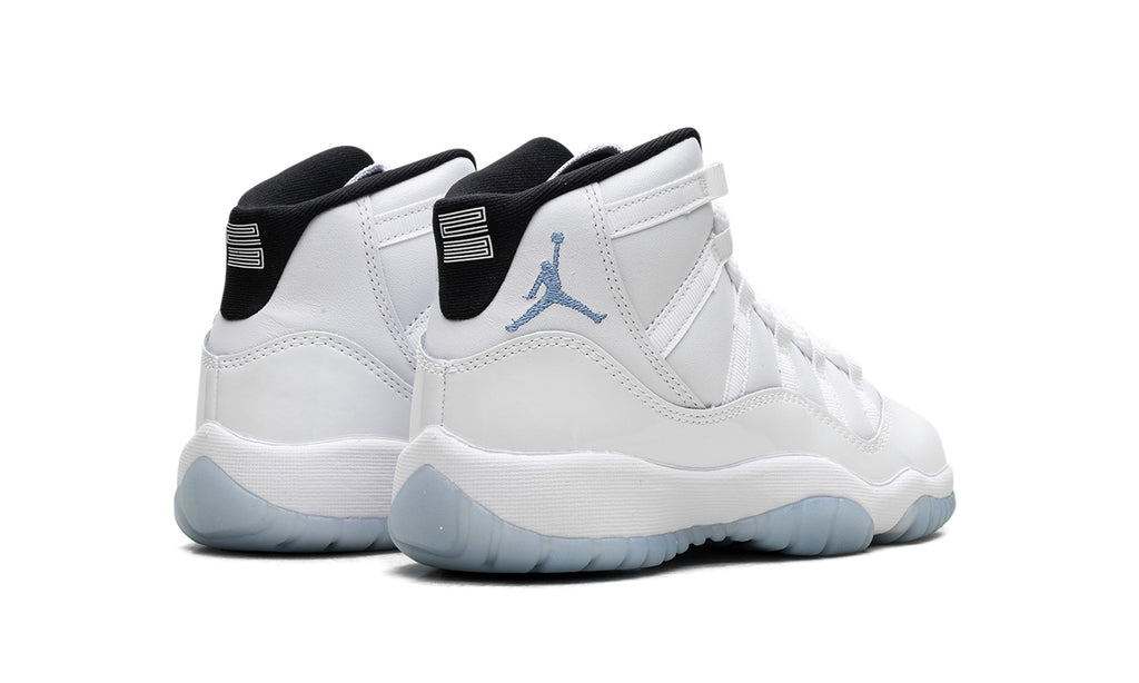 Air Jordan 11 Sneakers in White & Cream