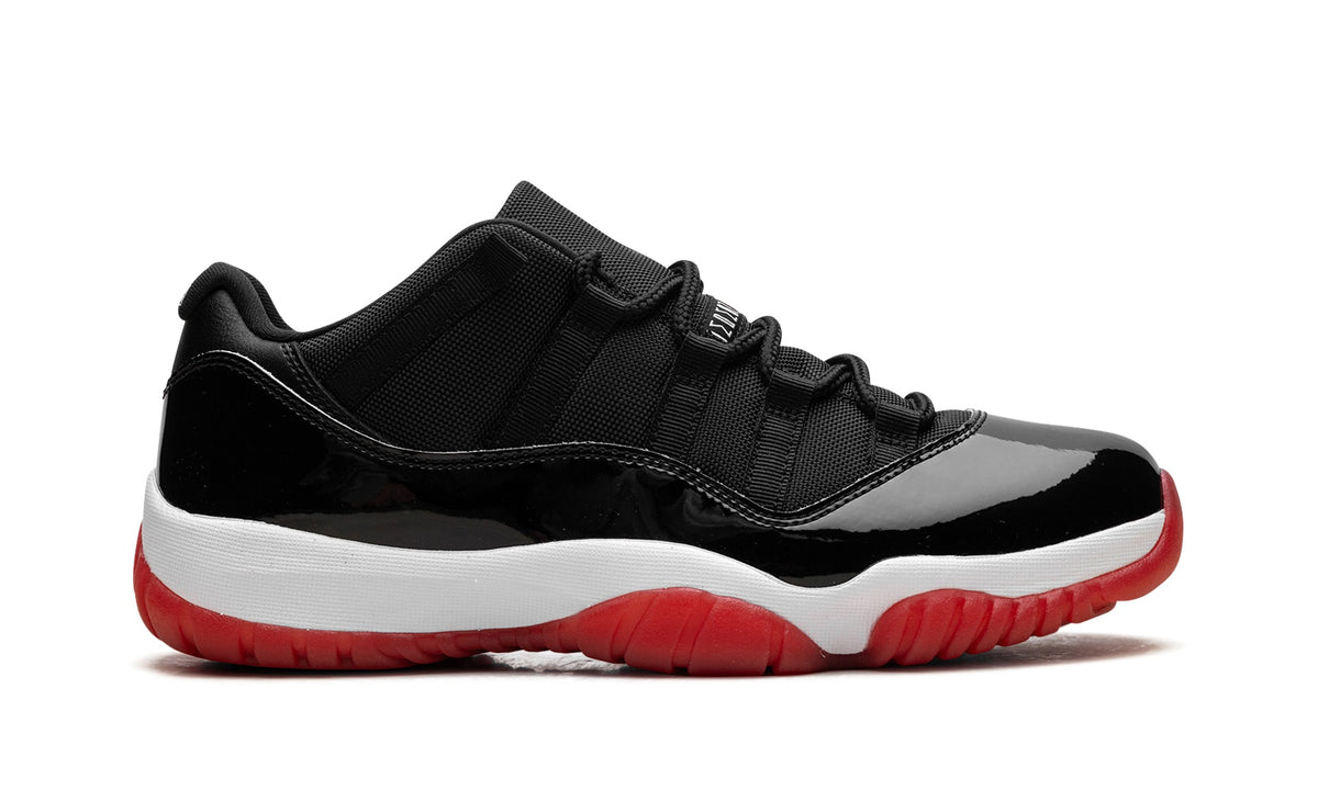 Air Jordan 11 Low Sneakers – Black, Red & White