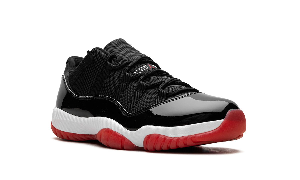 Air Jordan 11 Low Sneakers – Black, Red & White