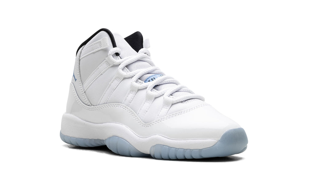 Air Jordan 11 Sneakers in White & Cream