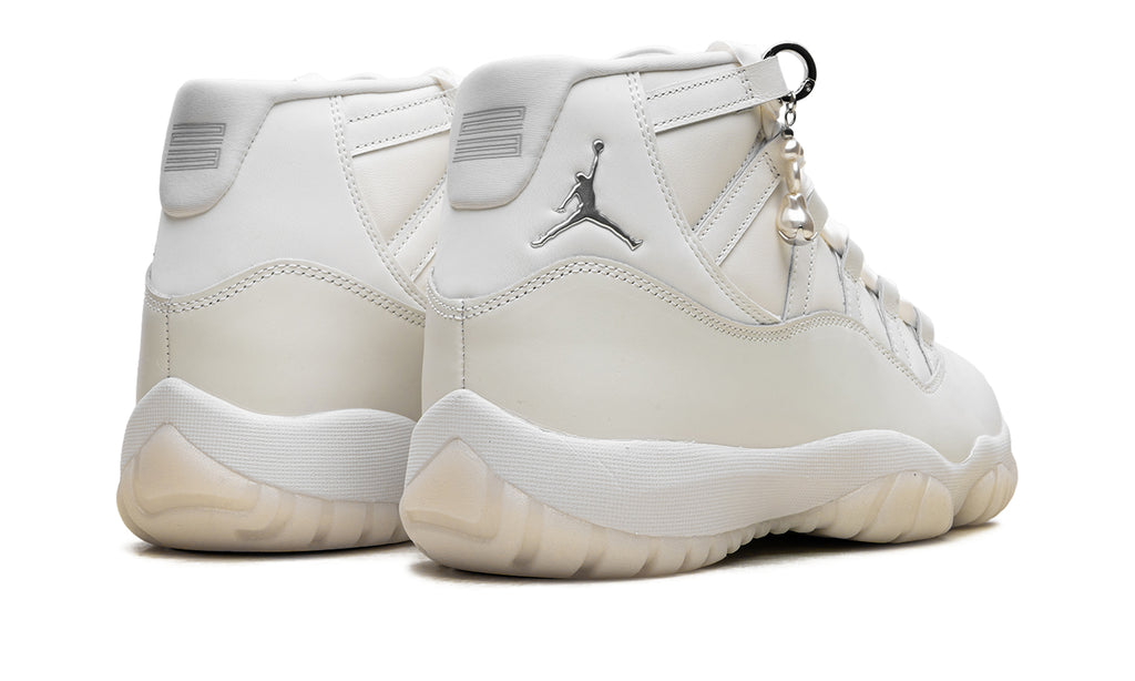 Air Jordan 11 Retro High-Top Sneakers - White and Cream with Metallic Silver Accents