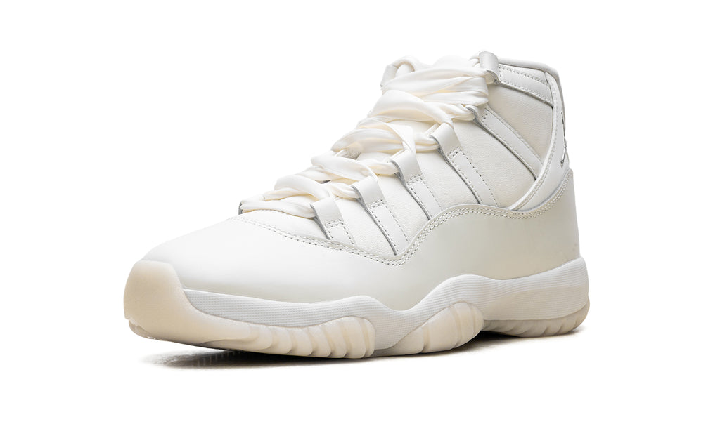 Air Jordan 11 Retro High-Top Sneakers - White and Cream with Metallic Silver Accents