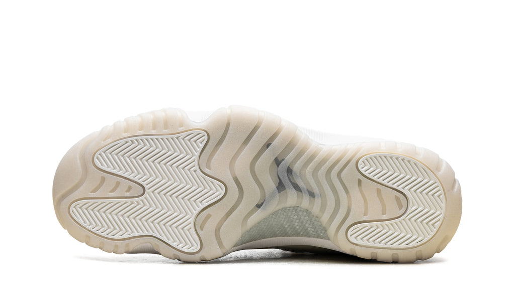 Air Jordan 11 Retro High-Top Sneakers - White and Cream with Metallic Silver Accents