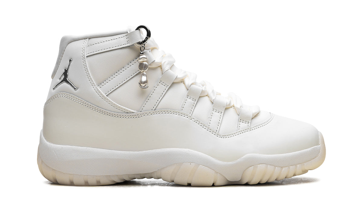 Air Jordan 11 Retro High-Top Sneakers - White and Cream with Metallic Silver Accents