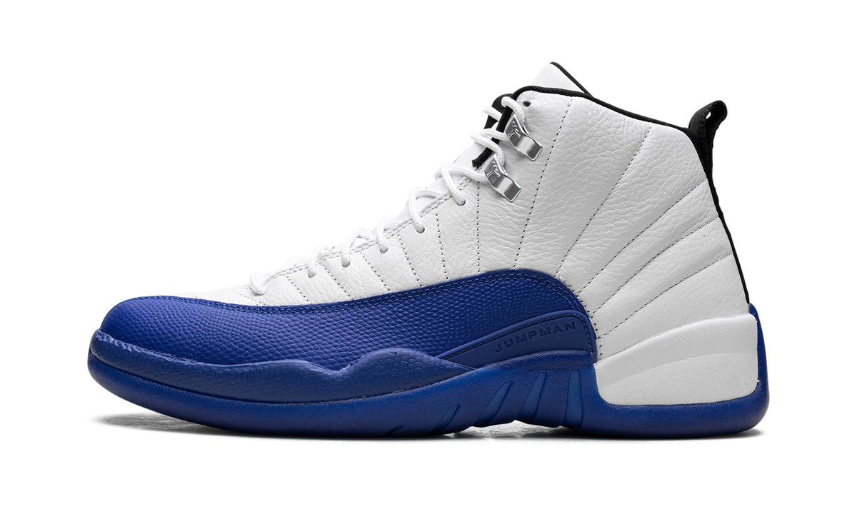Air Jordan 12 Sneakers in White & Royal Blue
