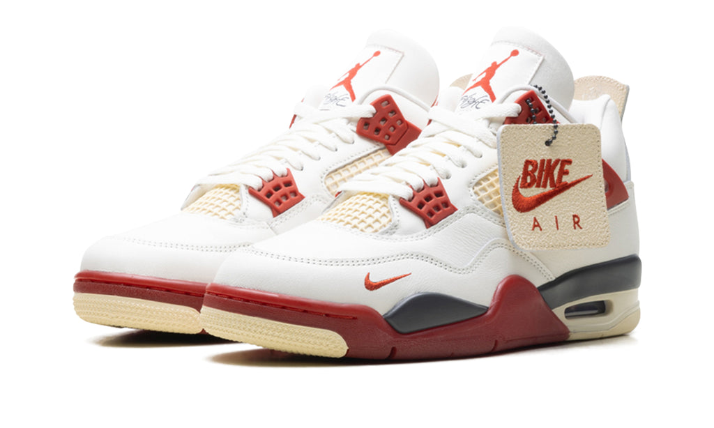 Air Jordan 4 Sneakers - White and Red with Cream and Charcoal Accents