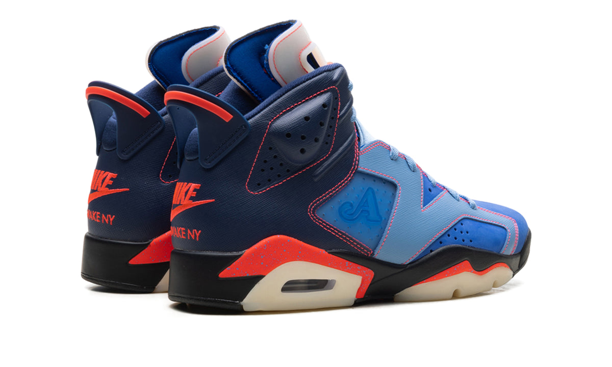 Air Jordan 6 Retro Sneakers - Blue & Navy with Orange Accents and Academy Heel Branding