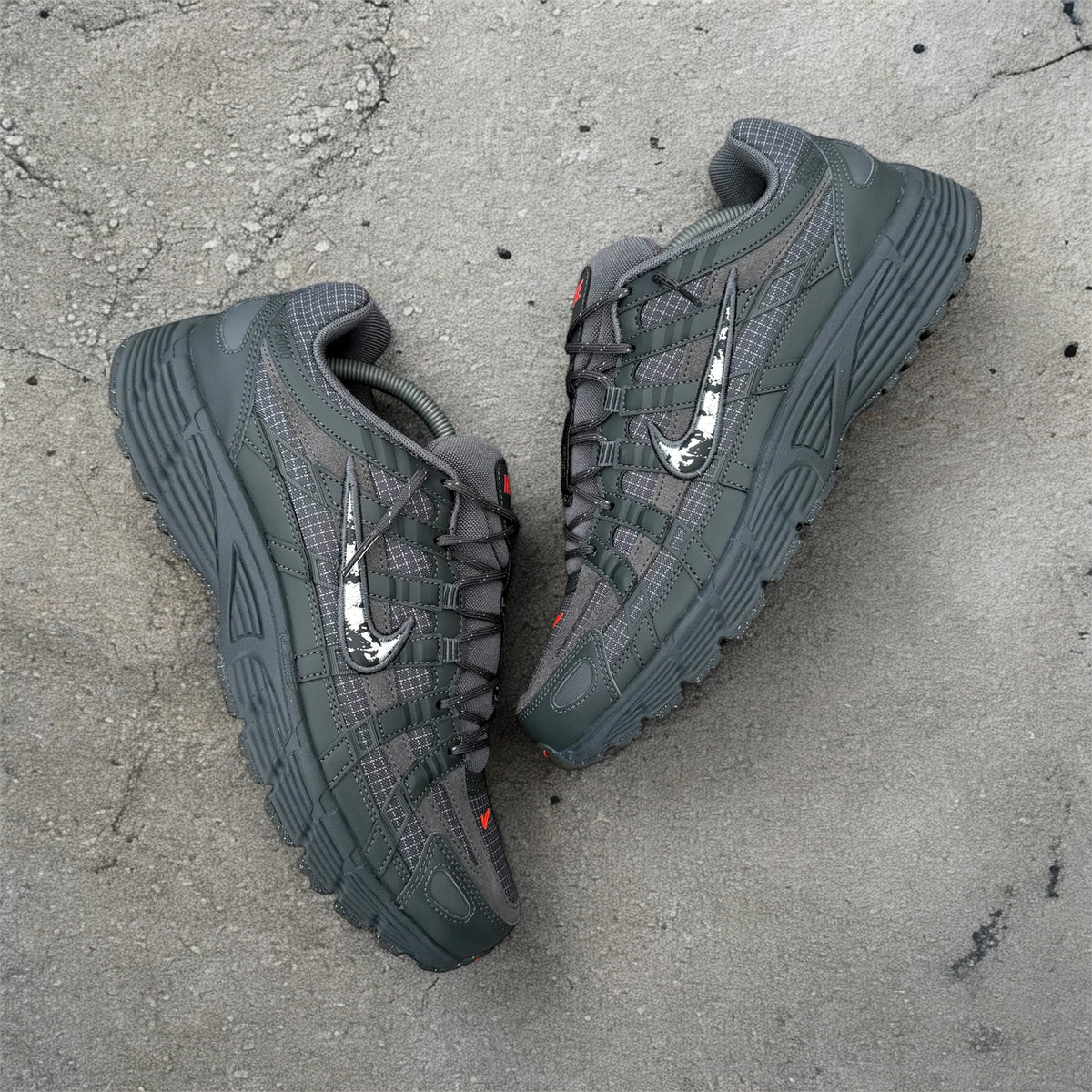 Nike P-6000 Sneakers – Dark Grey with Silver & Red Accents
