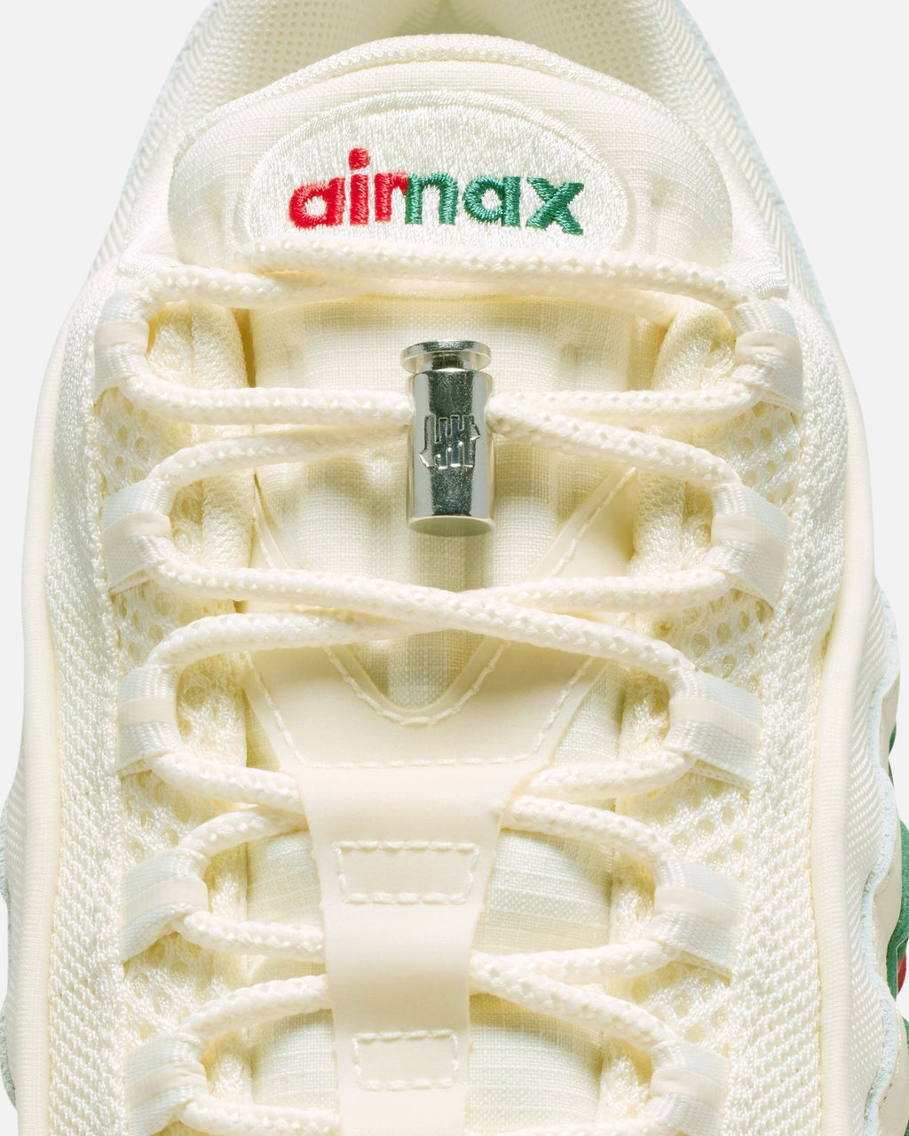 UNDEFEATED x Nike Air Max 95 Sneakers – Cream with Red & Green Accents
