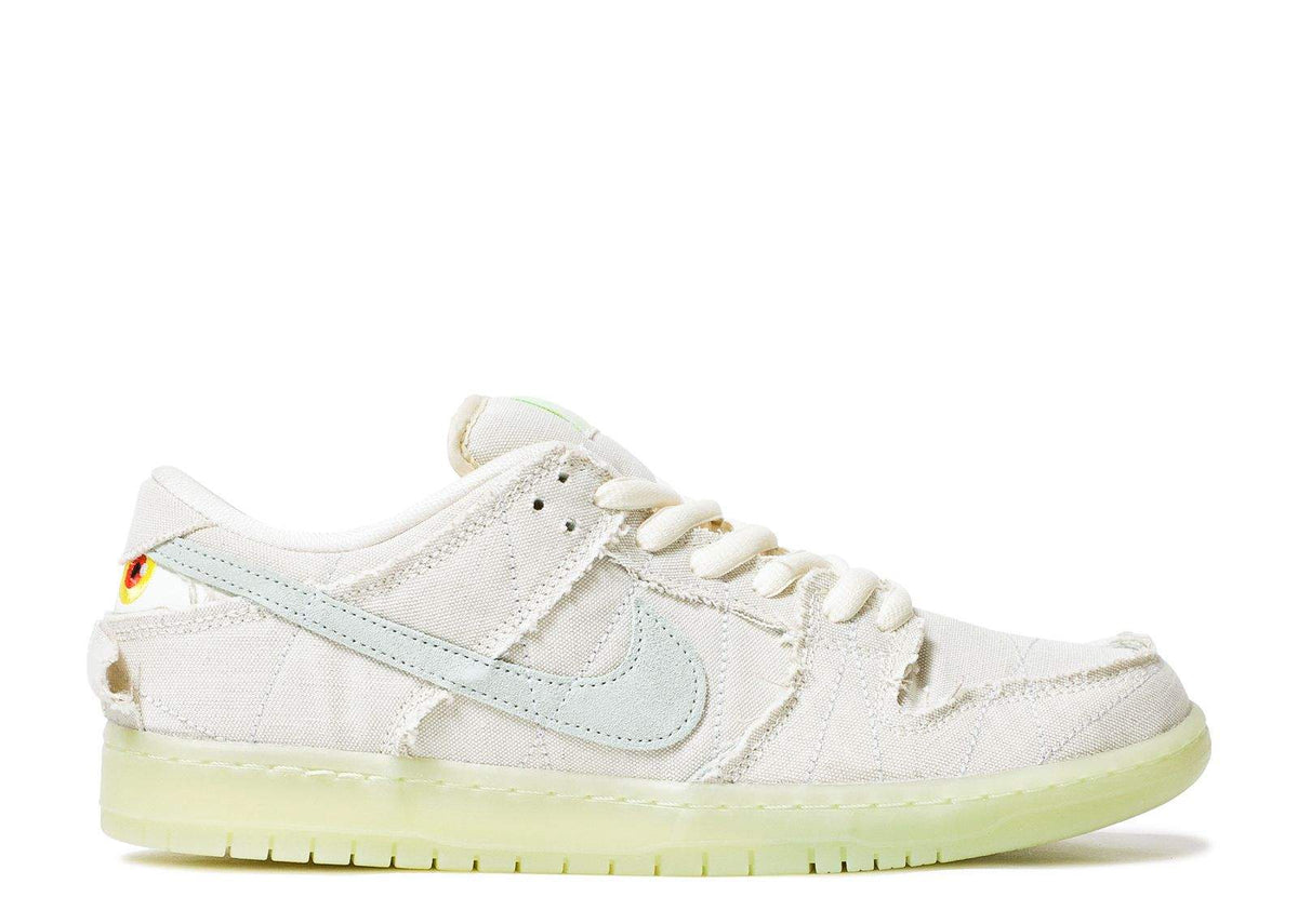 Nike SB Dunk Low Sneakers - Cream Canvas with Frayed Edges & Pale Green Sole