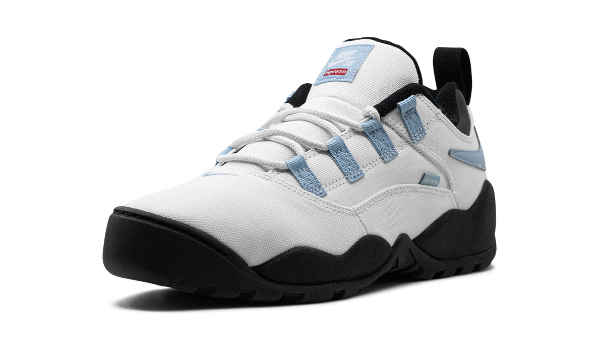 Supreme x Nike SB Darwin Low Sneakers – White, Light Blue & Black with Reverse Swooshes