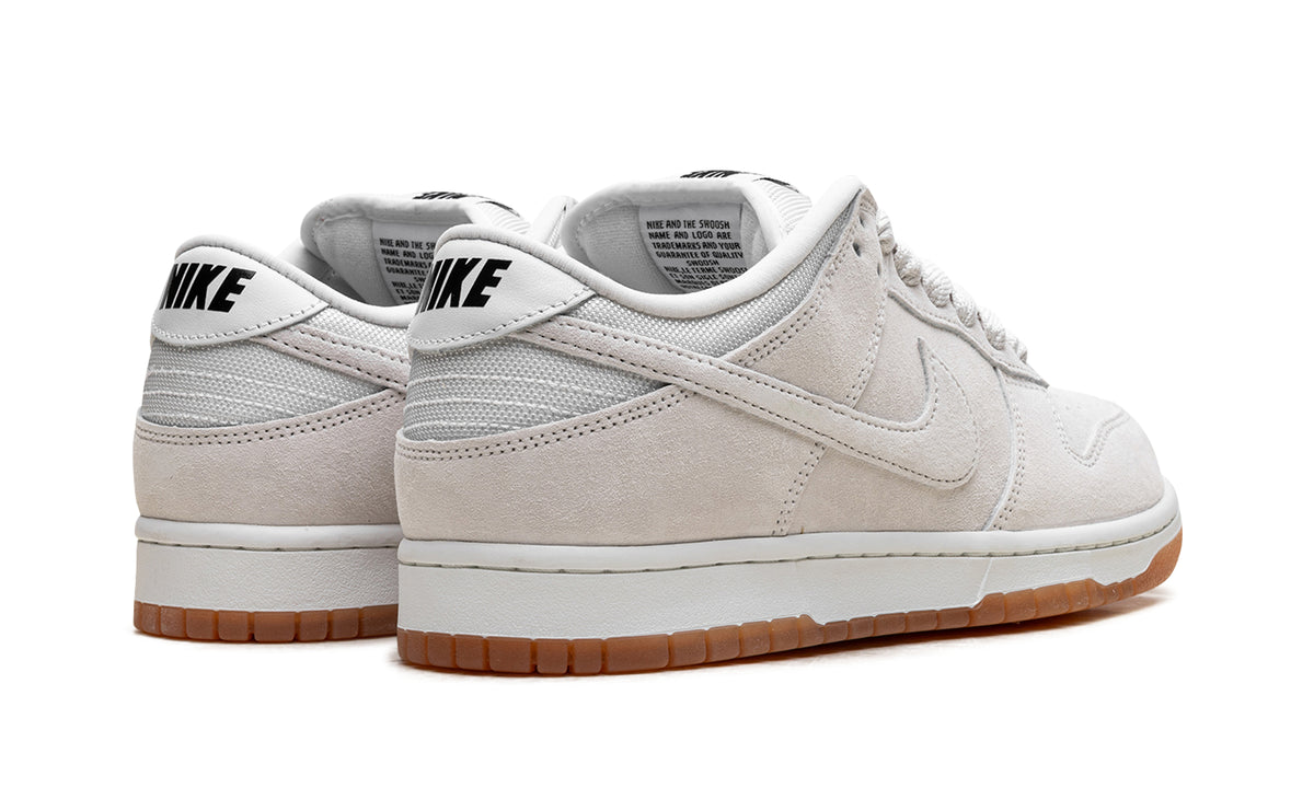 Nike SB Dunk Low Pro B Sneakers - Light Gray & Off-White with Gum Sole
