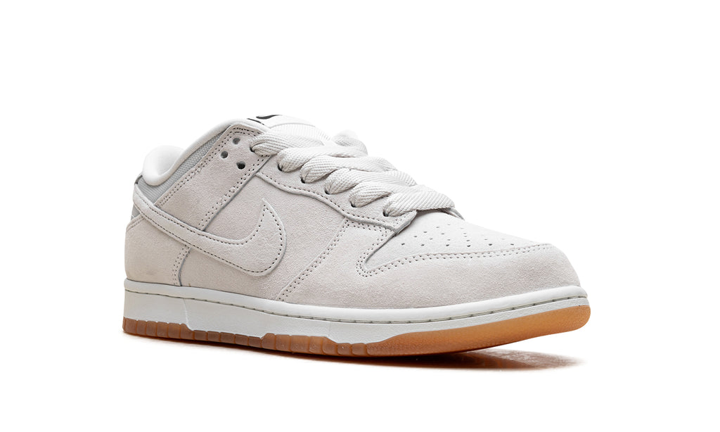 Nike SB Dunk Low Pro B Sneakers - Light Gray & Off-White with Gum Sole