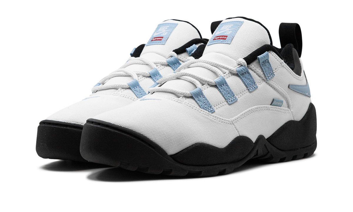 Supreme x Nike SB Darwin Low Sneakers – White, Light Blue & Black with Reverse Swooshes