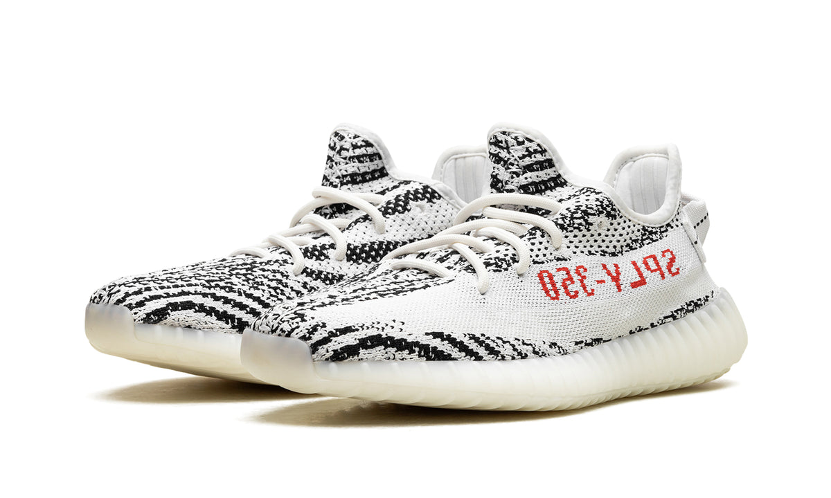 adidas Yeezy Boost 350 V2 Sneakers - White and Black Zebra Pattern with Red Lettering